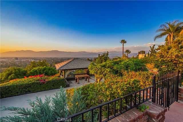 view of property's community featuring a mountain view and a gazebo