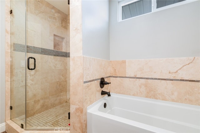 bathroom with independent shower and bath