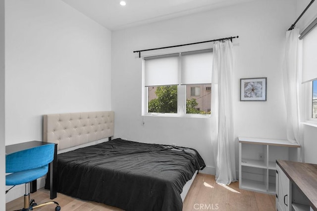 bedroom featuring light hardwood / wood-style floors