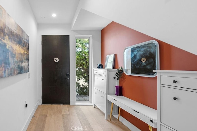 entryway with light hardwood / wood-style flooring