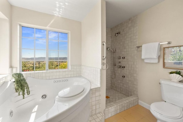 bathroom with shower with separate bathtub, tile patterned flooring, and toilet