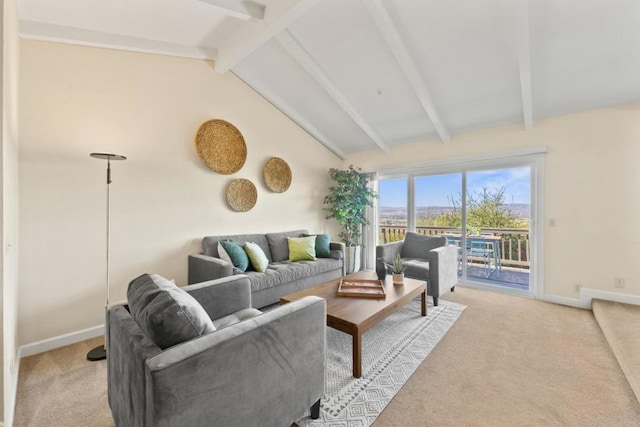 living room featuring vaulted ceiling with beams and light colored carpet