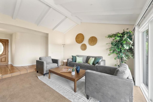 living room with vaulted ceiling with beams and light colored carpet