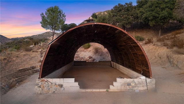 exterior space featuring a mountain view