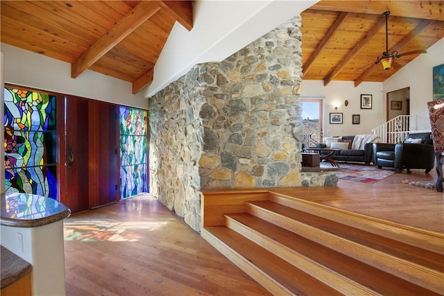 entryway featuring ceiling fan, wooden ceiling, beamed ceiling, high vaulted ceiling, and wood-type flooring