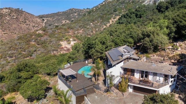 drone / aerial view featuring a mountain view