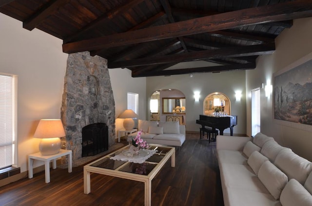 living room with a fireplace, wood ceiling, dark wood-type flooring, beam ceiling, and high vaulted ceiling