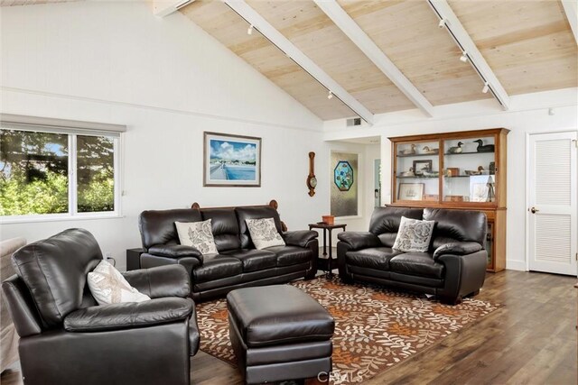 living room with beamed ceiling, track lighting, dark wood-type flooring, high vaulted ceiling, and wooden ceiling