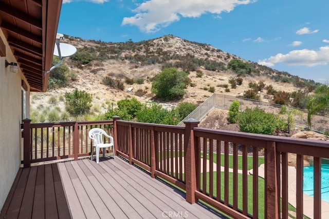 wooden terrace with a mountain view