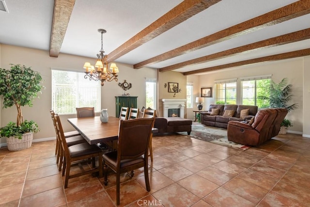 dining area with a notable chandelier, tile patterned flooring, and beamed ceiling