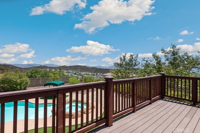 wooden terrace with a mountain view