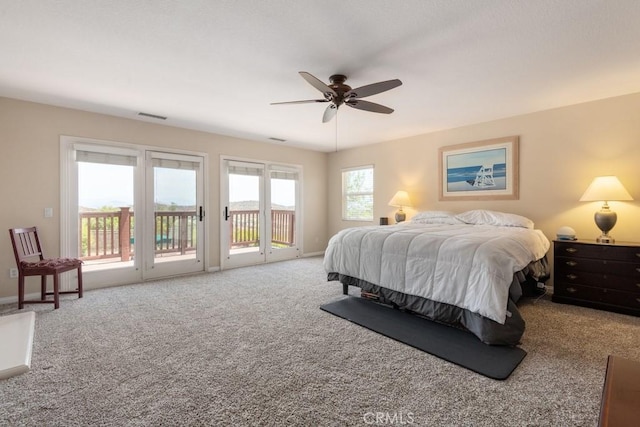 carpeted bedroom with access to exterior and ceiling fan