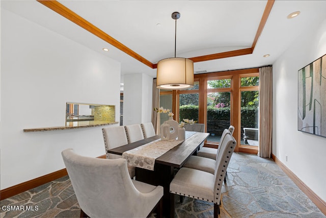 dining area featuring a tray ceiling