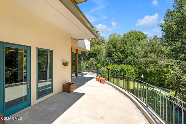 view of patio / terrace with a balcony