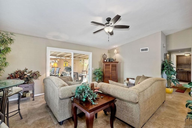 living room with lofted ceiling and ceiling fan