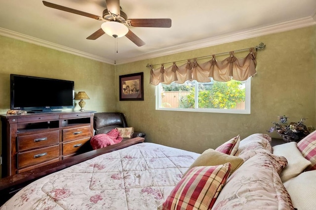 bedroom with crown molding and ceiling fan