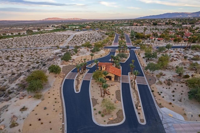 aerial view at dusk with a mountain view