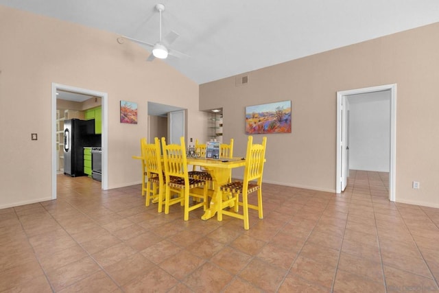 dining area featuring ceiling fan and lofted ceiling