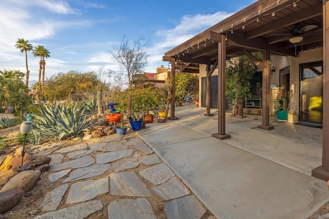 view of patio with ceiling fan