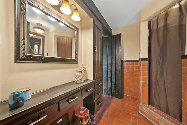 bathroom with tile walls