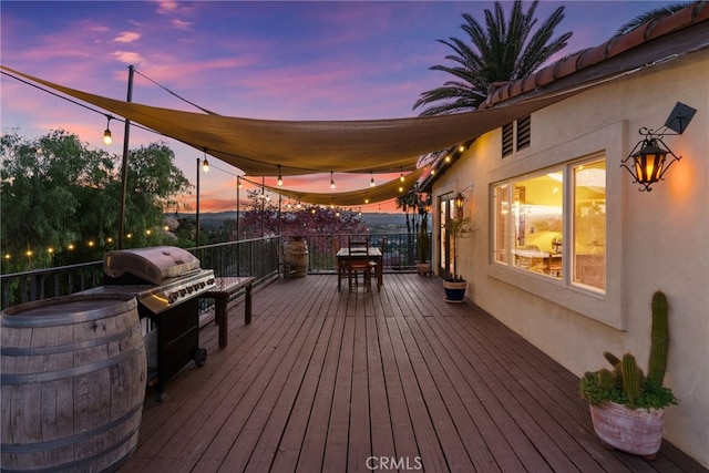 view of deck at dusk