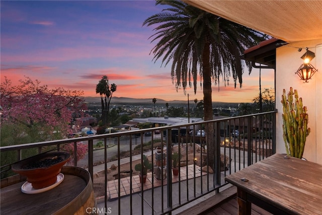 view of balcony at dusk