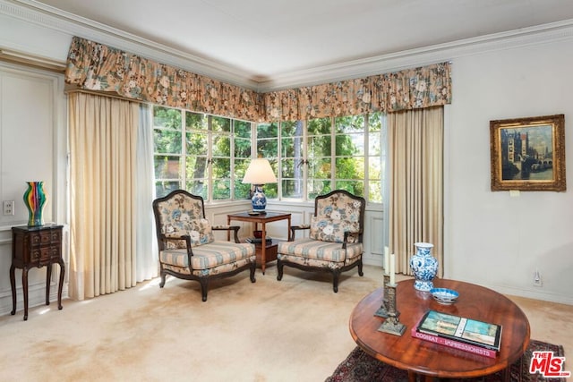 living area with carpet floors and crown molding