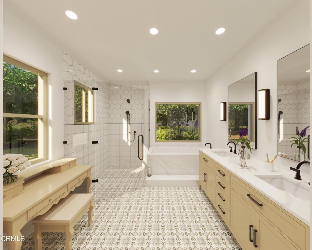 bathroom featuring a healthy amount of sunlight, a sink, and recessed lighting