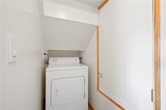 washroom with washer / dryer