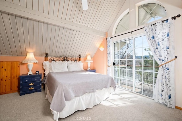 bedroom featuring vaulted ceiling with beams, access to outside, ceiling fan, and light colored carpet