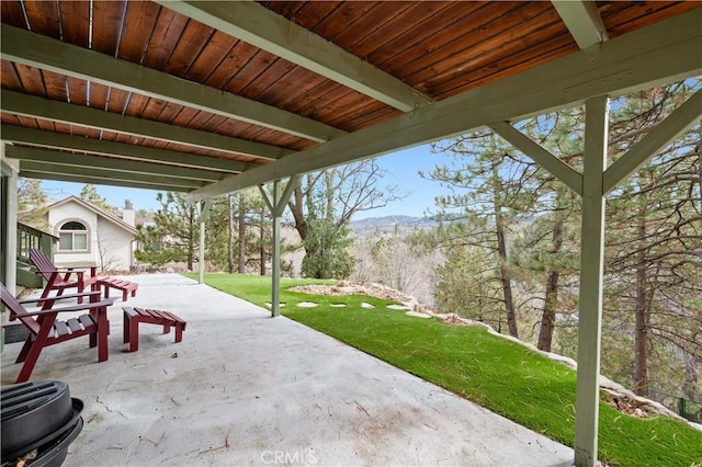 view of patio / terrace with a mountain view