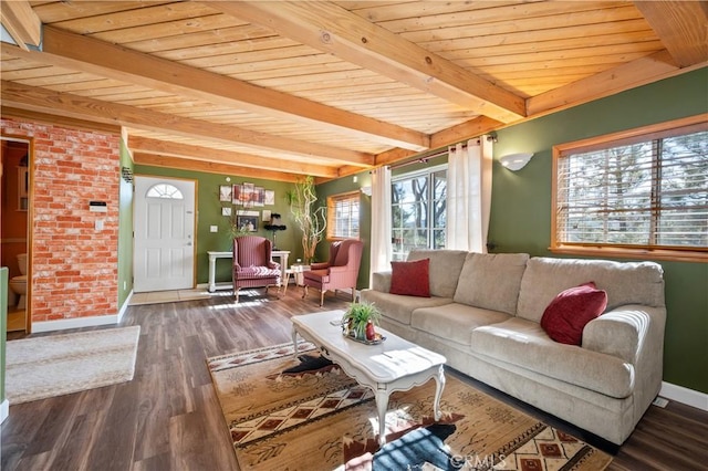 living room with beamed ceiling, dark hardwood / wood-style flooring, and wooden ceiling