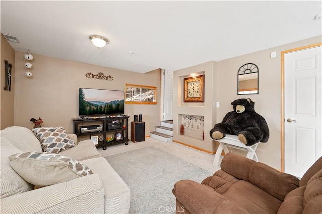 living room featuring light colored carpet