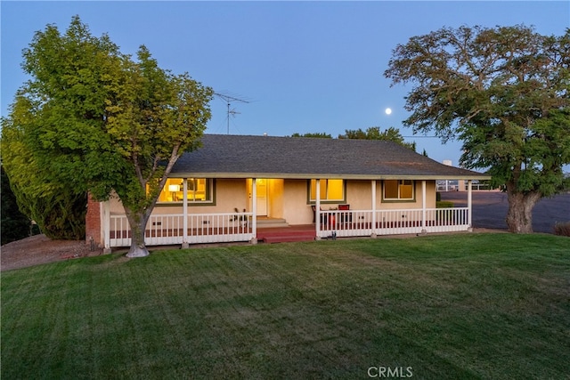 view of front of property with a front lawn and a porch