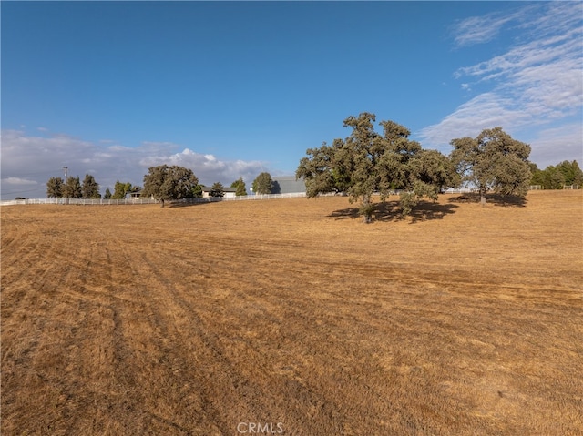 exterior space with a rural view