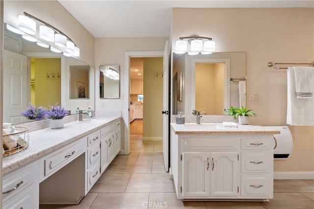 bathroom with vanity and tile patterned floors