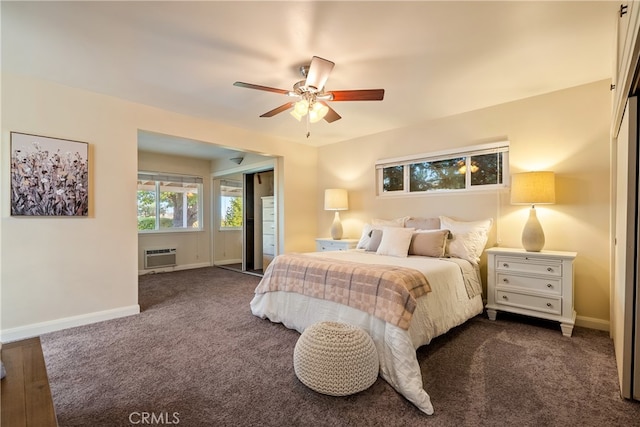 carpeted bedroom featuring ceiling fan and a wall mounted air conditioner