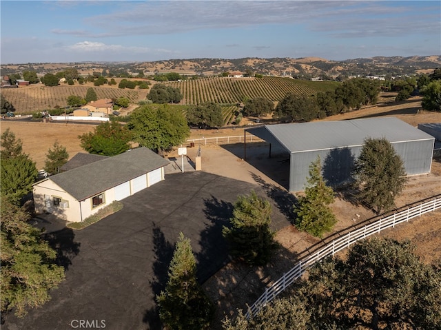 birds eye view of property featuring a rural view