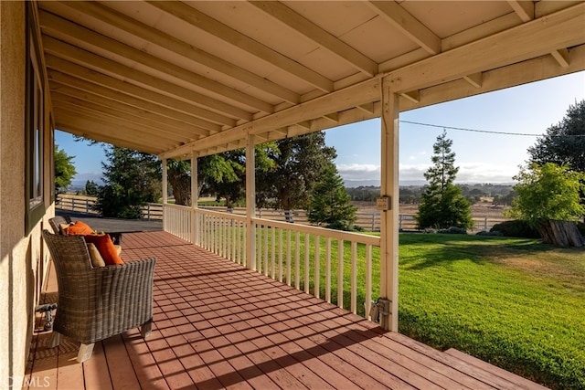 deck featuring a lawn