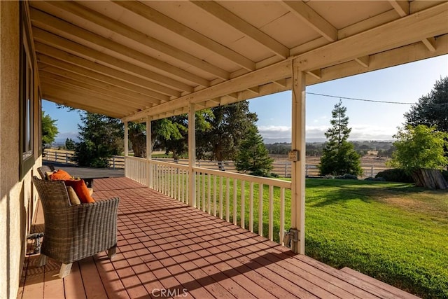 deck featuring a lawn