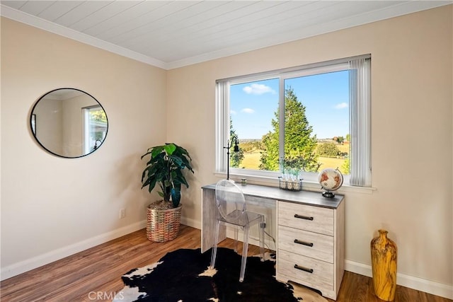 home office featuring ornamental molding, baseboards, wooden ceiling, and wood finished floors
