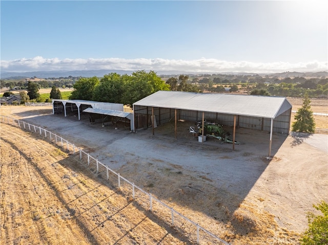 exterior space with a mountain view and a rural view