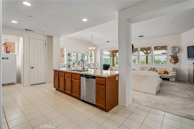 kitchen featuring light carpet, stainless steel dishwasher, sink, an inviting chandelier, and white fridge