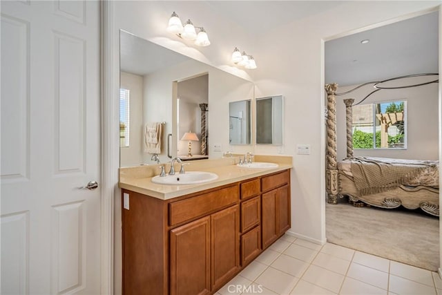 bathroom with tile patterned floors and vanity