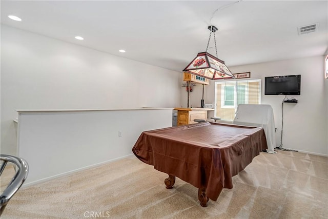 recreation room with light carpet and pool table