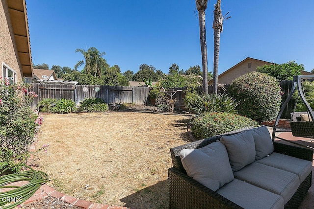 view of yard featuring a patio and an outdoor living space