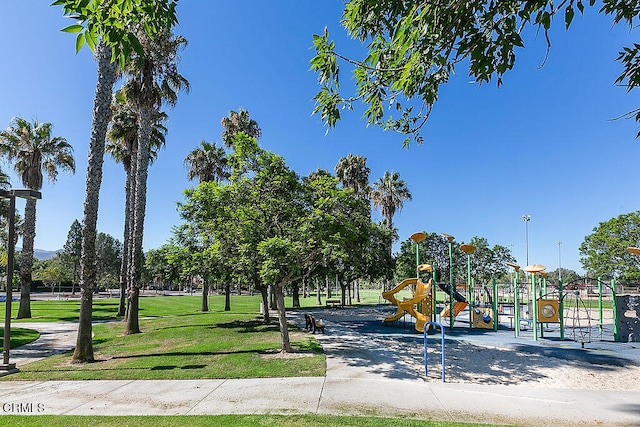 view of community with a playground and a yard