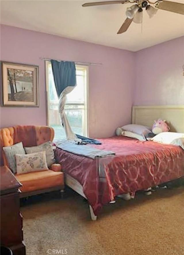 bedroom featuring carpet floors and ceiling fan