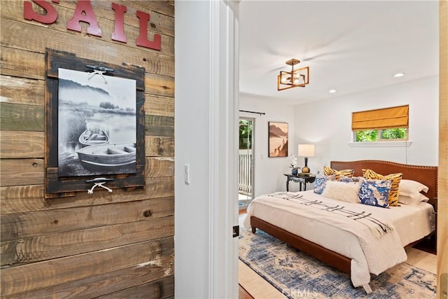 bedroom with wood-type flooring