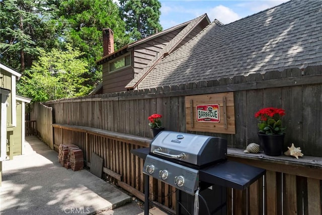 view of patio with a grill